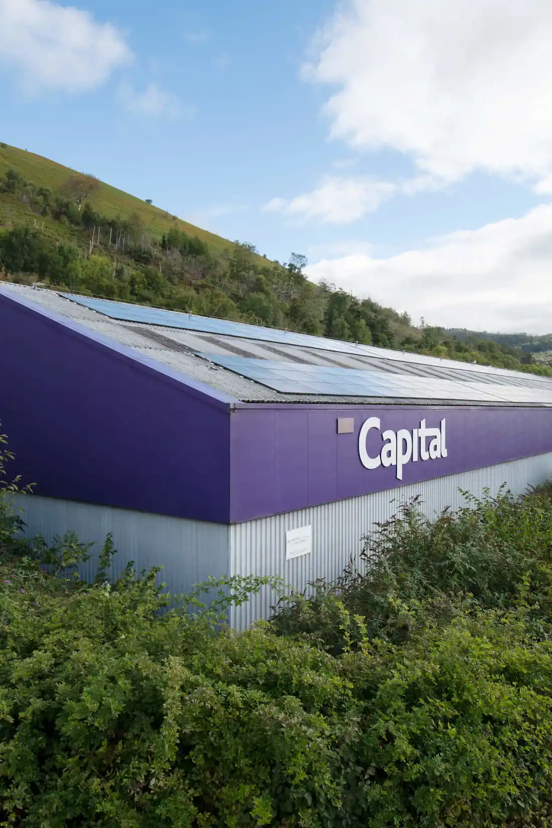Capital Coated Steel HQ, set against woodland